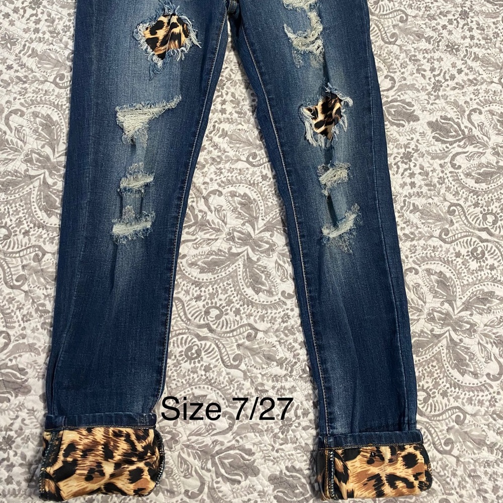 KanKan women’s leopard cut out jeans